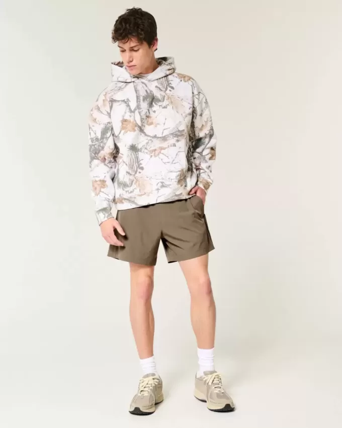 Hybrid-Aktivshorts bis zur Mitte des Oberschenkels Hybrid-Aktivshorts bis zur Mitte des Oberschenkels