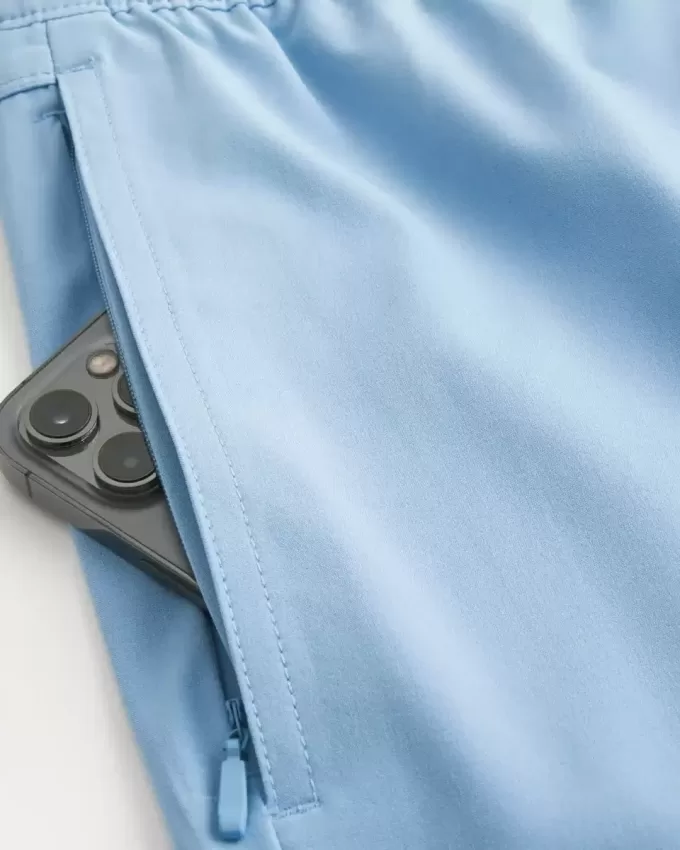 Hybrid-Aktivshorts bis zur Mitte des Oberschenkels Hybrid-Aktivshorts bis zur Mitte des Oberschenkels