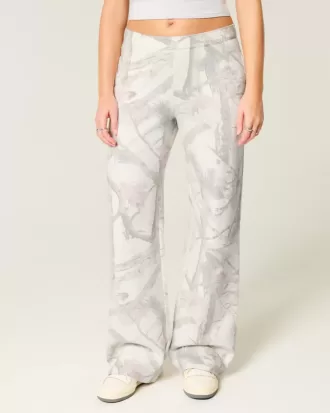 Jogginghose mit weitem Bein und Herztasche im Camouflage-Design Jogginghose mit weitem Bein und Herztasche im Camouflage-Design