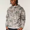 Kastenförmiger Kapuzenpullover mit Camouflage-Muster Kastenförmiger Kapuzenpullover mit Camouflage-Muster