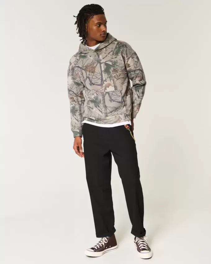 Kastenförmiger Kapuzenpullover mit Camouflage-Muster Kastenförmiger Kapuzenpullover mit Camouflage-Muster