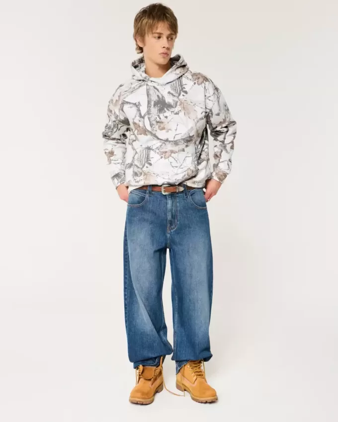 Kastenförmiger Kapuzenpullover mit Camouflage-Muster Kastenförmiger Kapuzenpullover mit Camouflage-Muster