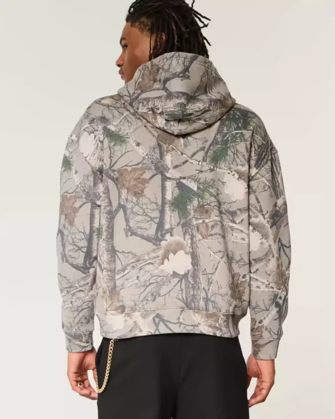 Kastenförmiger Kapuzenpullover mit Camouflage-Muster Kastenförmiger Kapuzenpullover mit Camouflage-Muster
