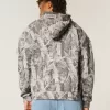 Kastenförmiger Kapuzenpullover mit Camouflage-Muster und Reißverschluss Kastenförmiger Kapuzenpullover mit Camouflage-Muster und Reißverschluss