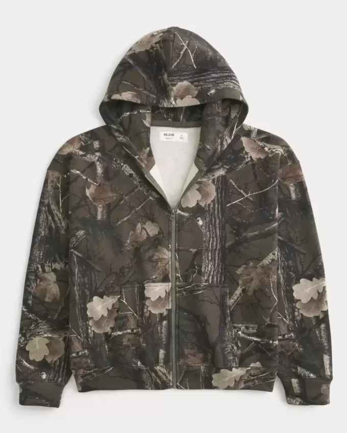 Kastenförmiger Kapuzenpullover mit Camouflage-Muster und Reißverschluss Kastenförmiger Kapuzenpullover mit Camouflage-Muster und Reißverschluss