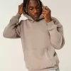 Kastenförmiger Kapuzenpullover mit Kontraststichen Kastenförmiger Kapuzenpullover mit Kontraststichen
