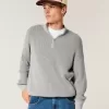 Kastenförmiger Pullover mit Viertelreißverschluss Kastenförmiger Pullover mit Viertelreißverschluss