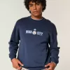 Kastenförmiges Manchester City FC-Sweatshirt mit Rundhalsausschnitt und Grafik Kastenförmiges Manchester City FC-Sweatshirt mit Rundhalsausschnitt und Grafik
