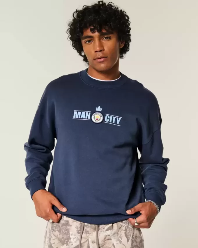 Kastenförmiges Manchester City FC-Sweatshirt mit Rundhalsausschnitt und Grafik Kastenförmiges Manchester City FC-Sweatshirt mit Rundhalsausschnitt und Grafik
