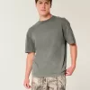Kastenförmiges, schweres T-Shirt mit Rundhalsausschnitt aus gewaschener Baumwolle Kastenförmiges, schweres T-Shirt mit Rundhalsausschnitt aus gewaschener Baumwolle