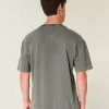 Kastenförmiges, schweres T-Shirt mit Rundhalsausschnitt aus gewaschener Baumwolle Kastenförmiges, schweres T-Shirt mit Rundhalsausschnitt aus gewaschener Baumwolle