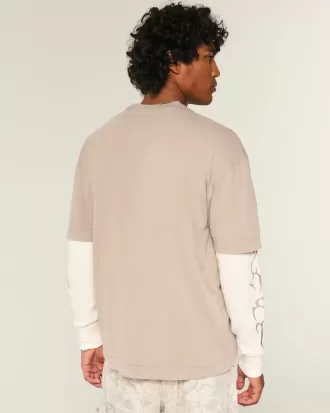 Kastenförmiges, schweres T-Shirt mit Rundhalsausschnitt aus gewaschener Baumwolle Kastenförmiges, schweres T-Shirt mit Rundhalsausschnitt aus gewaschener Baumwolle
