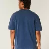 Kastenförmiges, schweres T-Shirt mit Rundhalsausschnitt aus gewaschener Baumwolle Kastenförmiges, schweres T-Shirt mit Rundhalsausschnitt aus gewaschener Baumwolle