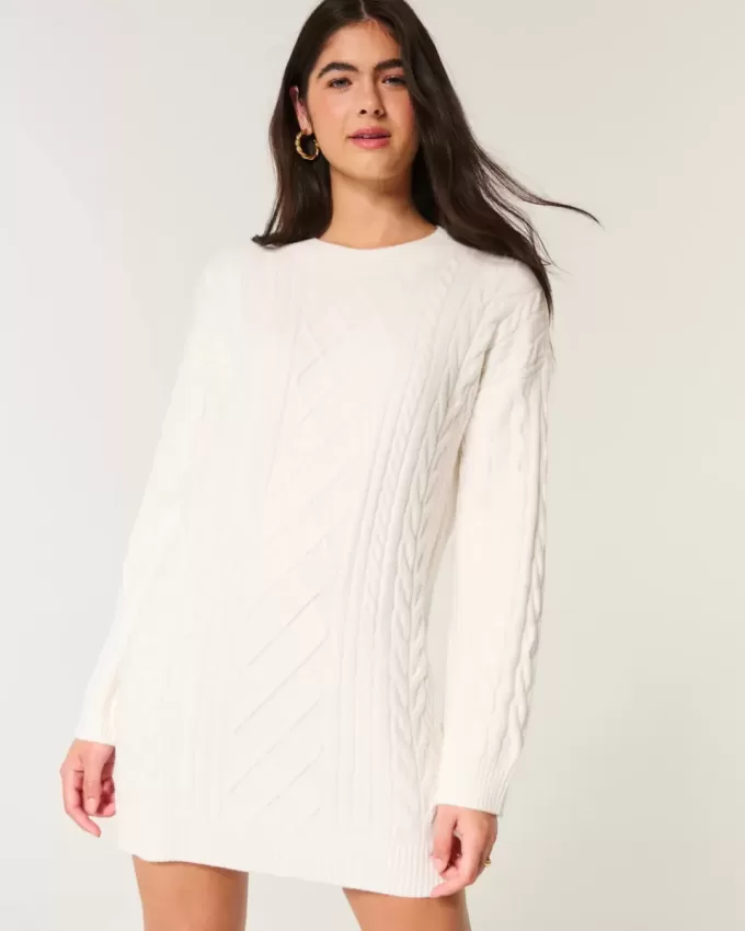 Kuscheliges Pulloverkleid mit Zopfmuster Kuscheliges Pulloverkleid mit Zopfmuster