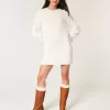 Kuscheliges Pulloverkleid mit Zopfmuster Kuscheliges Pulloverkleid mit Zopfmuster