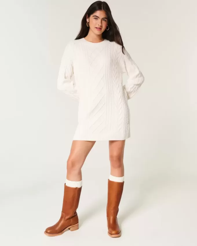 Kuscheliges Pulloverkleid mit Zopfmuster Kuscheliges Pulloverkleid mit Zopfmuster