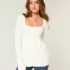 Langärmliger Babydoll-Pullover mit eckigem Ausschnitt Langärmliger Babydoll-Pullover mit eckigem Ausschnitt