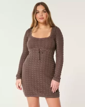Langärmliges Minikleid im Häkelstil Langärmliges Minikleid im Häkelstil