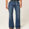 Lockere Bootcut-Jeans in dunkler Waschung Lockere Bootcut-Jeans in dunkler Waschung
