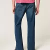 Lockere Bootcut-Jeans in dunkler Waschung Lockere Bootcut-Jeans in dunkler Waschung