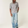 Lockere Bootcut-Jeans in mittlerer Waschung Lockere Bootcut-Jeans in mittlerer Waschung