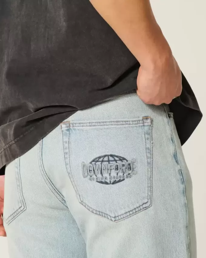 Lockere Jeans mit Downforce Racing-Grafik in heller Waschung Lockere Jeans mit Downforce Racing-Grafik in heller Waschung