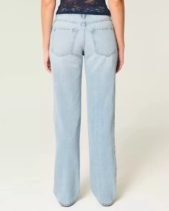 Lockere Jeans mit niedrigem Bund und heller Waschung Lockere Jeans mit niedrigem Bund und heller Waschung
