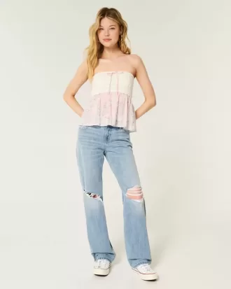 Lockere Jeans mit niedrigem Bund und Rissen in heller Waschung