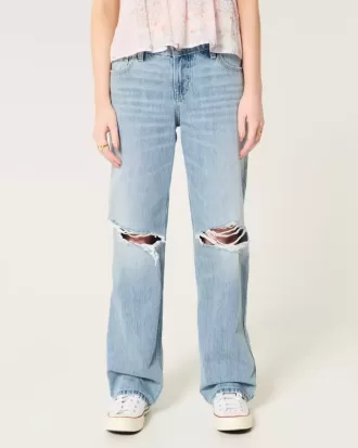 Lockere Jeans mit niedrigem Bund und Rissen in heller Waschung