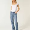 Lockere Jeans mit niedrigem Bund und Rissen in mittlerer Waschung Lockere Jeans mit niedrigem Bund und Rissen in mittlerer Waschung