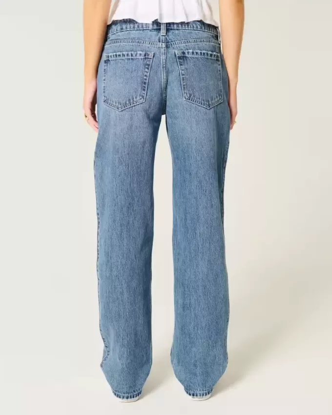 Lockere Jeans mit niedrigem Bund und Rissen in mittlerer Waschung Lockere Jeans mit niedrigem Bund und Rissen in mittlerer Waschung