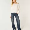 Lockere Jeans mit niedriger Taille und dunkler Waschung Lockere Jeans mit niedriger Taille und dunkler Waschung