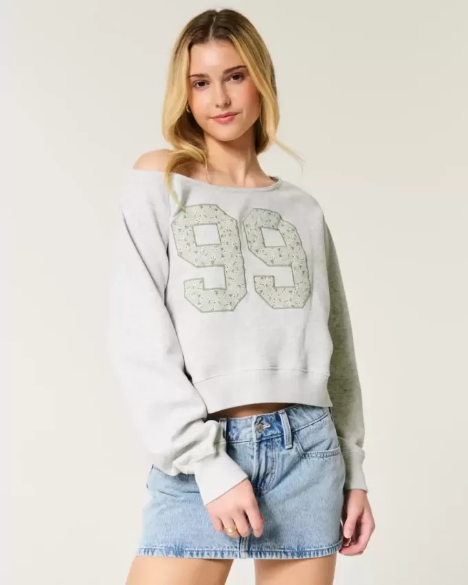 Lockeres, schulterfreies Sweatshirt mit Rundhalsausschnitt und Zahlengrafik Lockeres, schulterfreies Sweatshirt mit Rundhalsausschnitt und Zahlengrafik