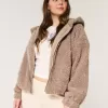 Lockige Kunstpelzjacke mit Reißverschluss Lockige Kunstpelzjacke mit Reißverschluss
