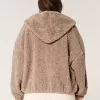 Lockige Kunstpelzjacke mit Reißverschluss Lockige Kunstpelzjacke mit Reißverschluss