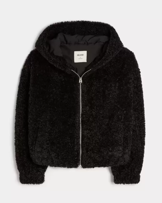 Lockige Kunstpelzjacke mit Reißverschluss Lockige Kunstpelzjacke mit Reißverschluss