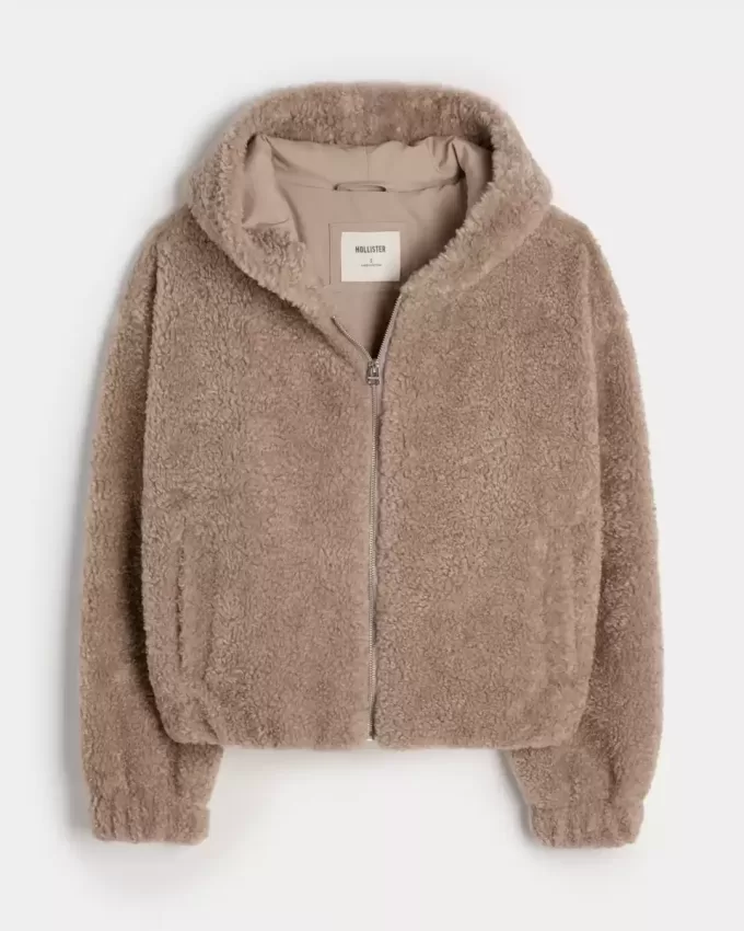 Lockige Kunstpelzjacke mit Reißverschluss Lockige Kunstpelzjacke mit Reißverschluss