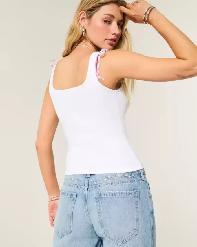 Low-Rise Baggy-Jeans mit Blumenstickerei in mittlerer Waschung Low-Rise Baggy-Jeans mit Blumenstickerei in mittlerer Waschung