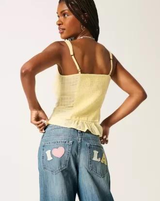 Low-Rise Baggy-Jeans mit mittlerer Waschung und Los Angeles-Grafik