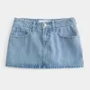 Low-Rise-Mini-Skort aus Denim in mittlerer Waschung Low-Rise-Mini-Skort aus Denim in mittlerer Waschung