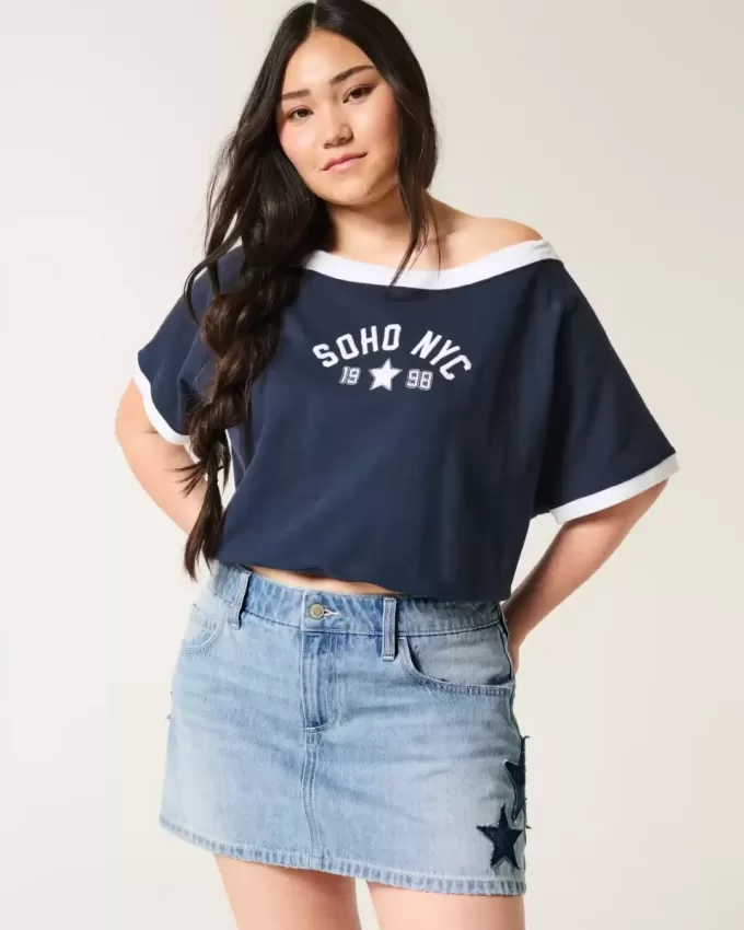 Low-Rise-Mini-Skort aus Denim mit Stern-Applikation in mittlerer Waschung Low-Rise-Mini-Skort aus Denim mit Stern-Applikation in mittlerer Waschung