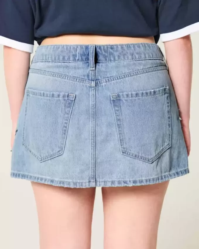 Low-Rise-Mini-Skort aus Denim mit Stern-Applikation in mittlerer Waschung Low-Rise-Mini-Skort aus Denim mit Stern-Applikation in mittlerer Waschung