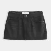 Low-Rise-Mini-Skort aus verwaschenem schwarzem Denim Low-Rise-Mini-Skort aus verwaschenem schwarzem Denim