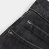Low-Rise-Mini-Skort aus verwaschenem schwarzem Denim Low-Rise-Mini-Skort aus verwaschenem schwarzem Denim