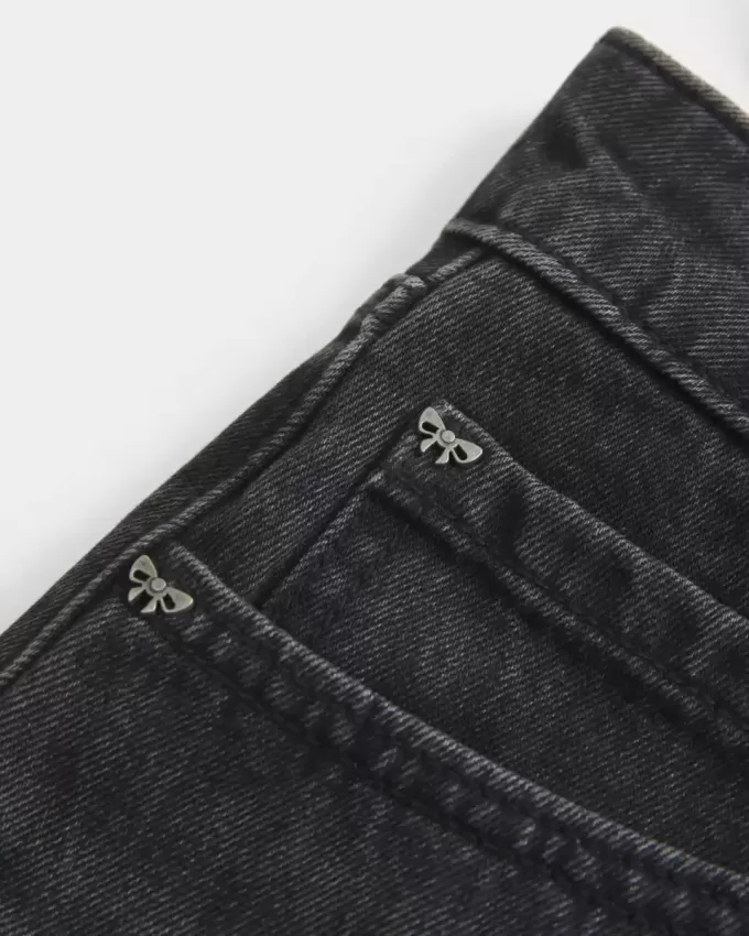 Low-Rise-Mini-Skort aus verwaschenem schwarzem Denim Low-Rise-Mini-Skort aus verwaschenem schwarzem Denim