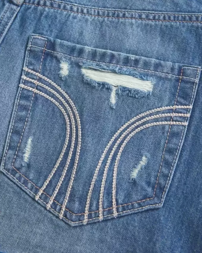 Low-Rise-Mini-Skort aus zerrissenem, dunkel gewaschenem Denim Low-Rise-Mini-Skort aus zerrissenem, dunkel gewaschenem Denim