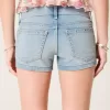 Low-Rise-Shortie-Shorts aus Denim mit mittlerer Waschung und Nieten Low-Rise-Shortie-Shorts aus Denim mit mittlerer Waschung und Nieten