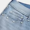 Low-Rise-Shortie-Shorts aus Denim mit mittlerer Waschung und Nieten Low-Rise-Shortie-Shorts aus Denim mit mittlerer Waschung und Nieten