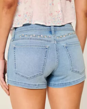 Low-Rise-Shortie-Shorts aus hell gewaschenem Denim mit Blumenstickerei
