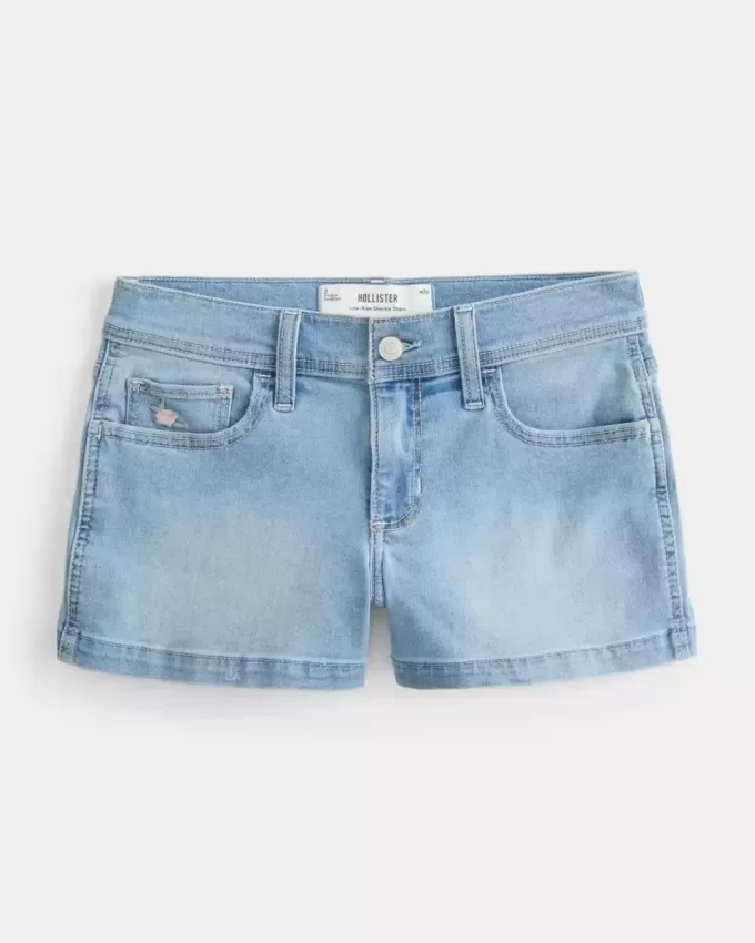 Low-Rise-Shortie-Shorts aus hell gewaschenem Denim mit Blumenstickerei Low-Rise-Shortie-Shorts aus hell gewaschenem Denim mit Blumenstickerei